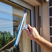 squeegee cleaning glass